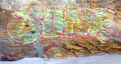 Grafitti on North Coast beach rocks